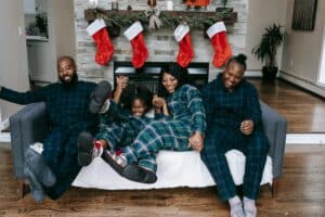 Family wearing Christmas pajamas